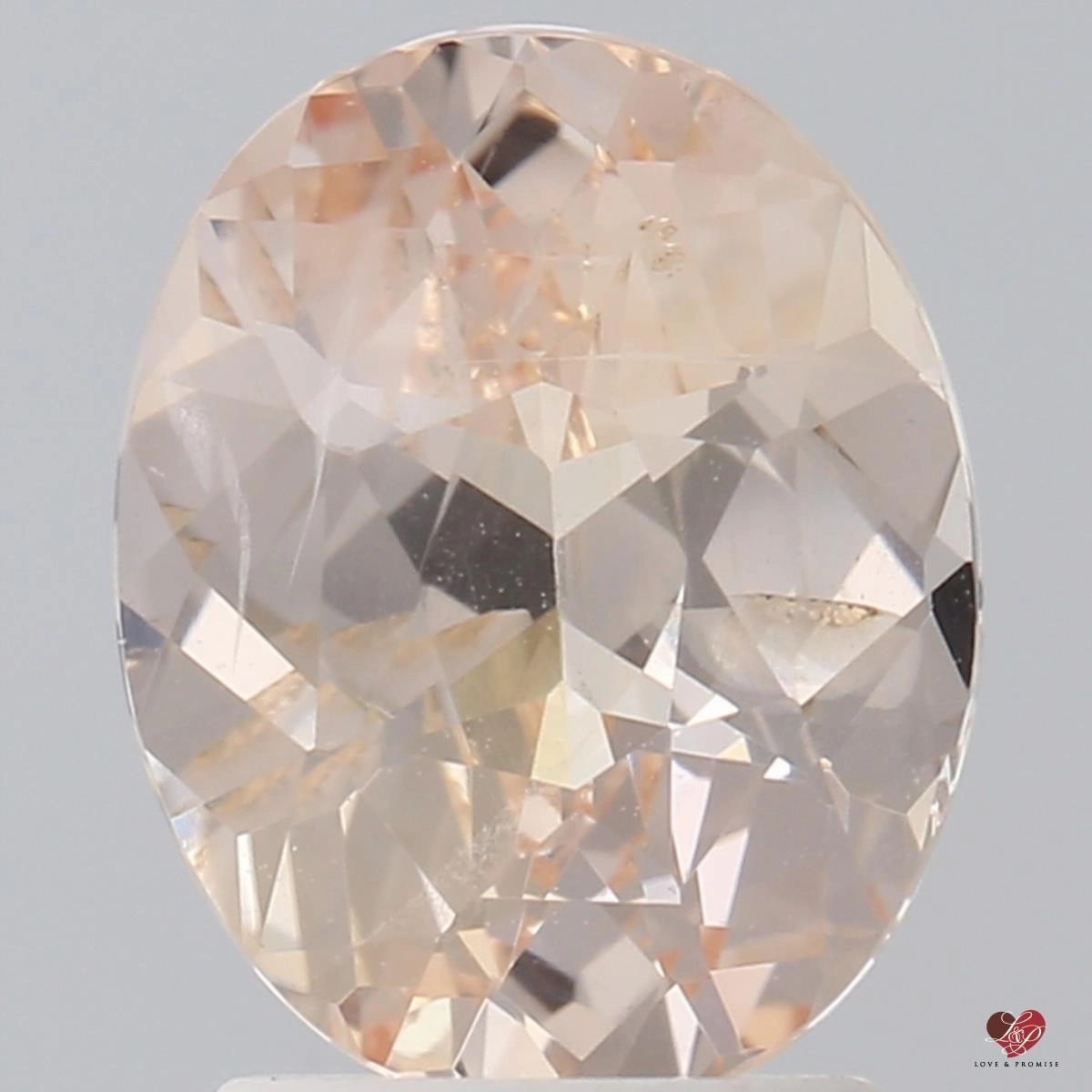 2.42cts Oval Peachy Blush Champagne Sapphire